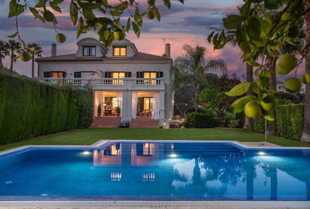 Sotogrande 4 Luxury villa in Sotogrande with a private pool, lush garden, and sunset view.